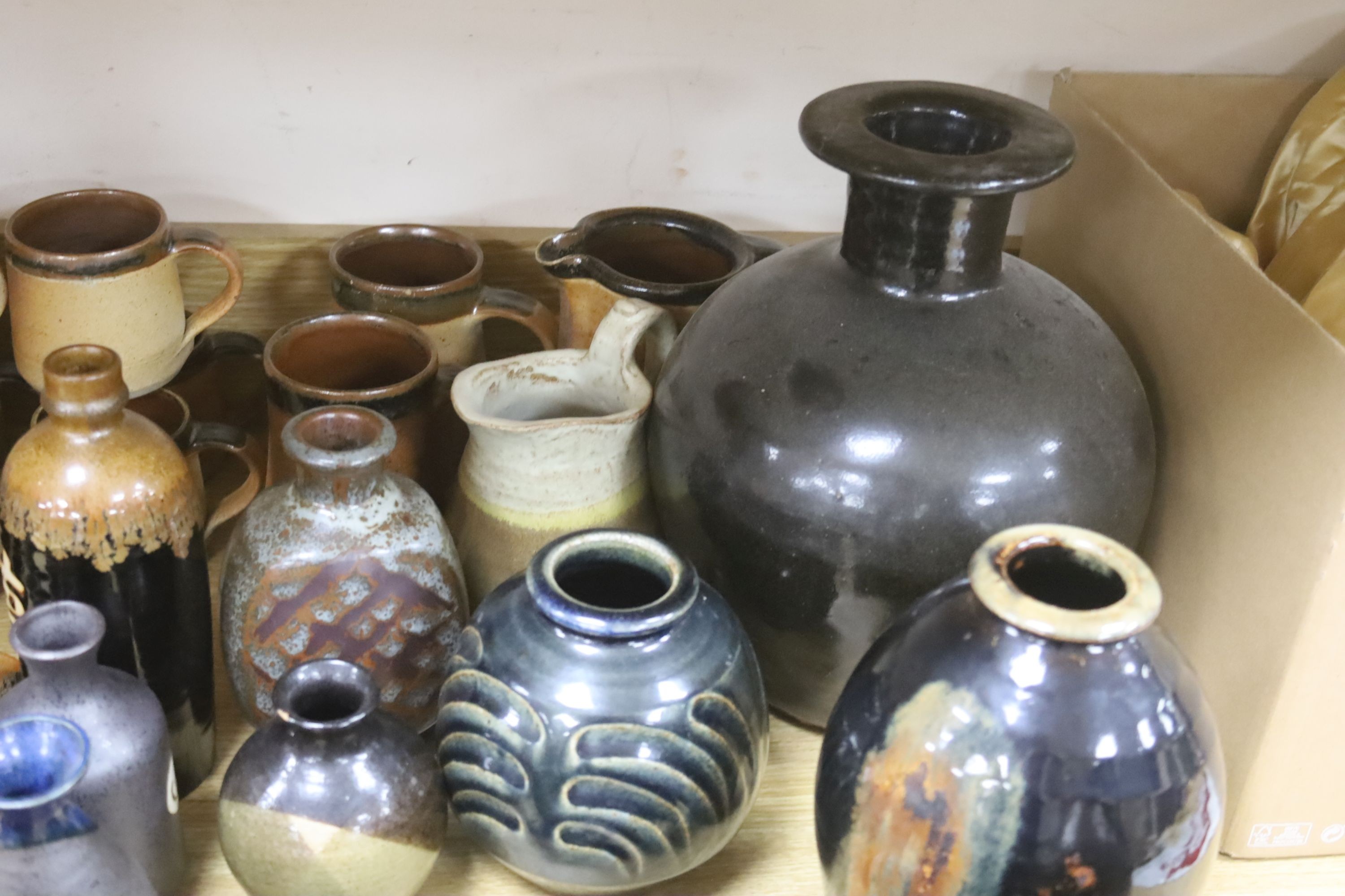 A collection of Studio pottery vases and a Bellarmine